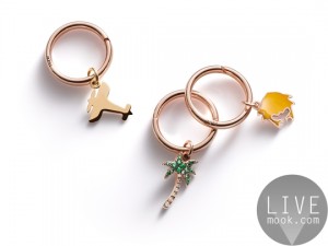 Dodo brise rings with palm, crab and aeroplane charms